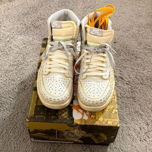 Air Jordan 1 Retro Hi OG SP Cream, White, Grey, and Orange Accents